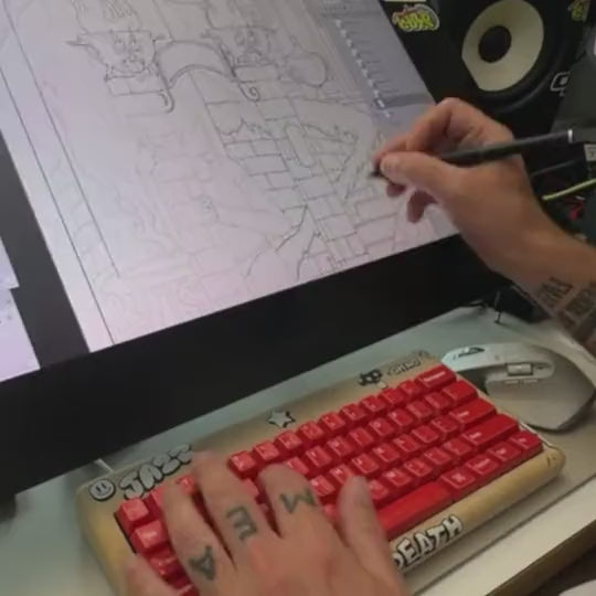 mcbess drawing The Lodge at his desk with the red keyboard