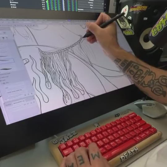 mcbess drawing on his tablet in the studio